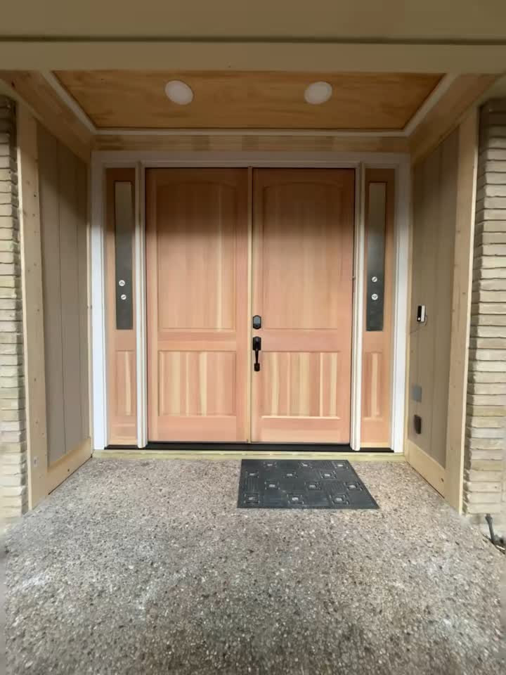 Finished double entry doors with sidelights by Asier Services in Dallas, TX