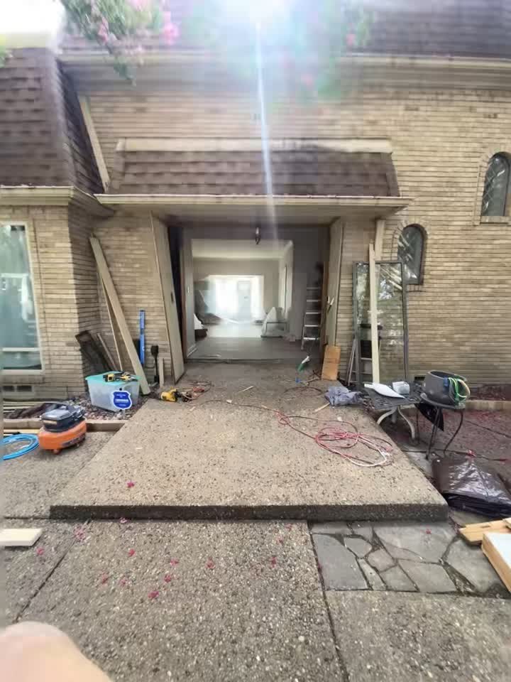 Covered entryway door opening mid-installation by Asier Services in Dallas, TX