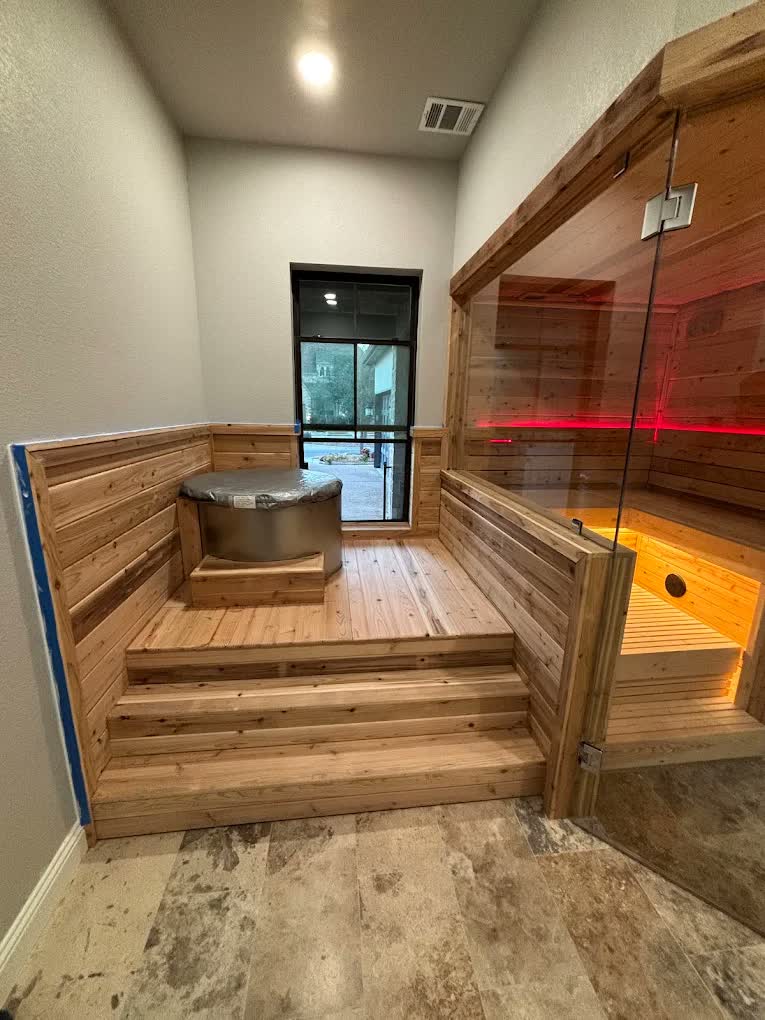 Finished sauna and hot tub room by Asier Services